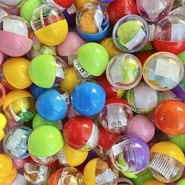 Игрушки в капсулах 34 мм